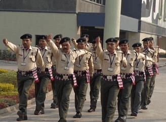 Security guards marching in disciplined formation